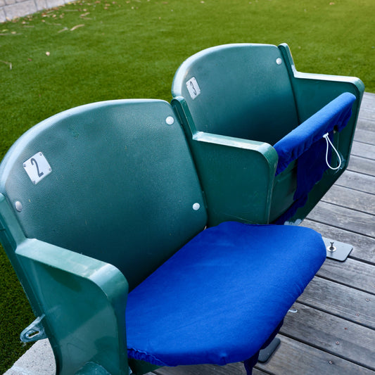 bright blue seat cover on stadium seat